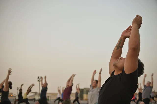 men, yoga class, gym, instructor, hatha yoga, professor, posture, person, moral, wellness, hobbies, relaxation, stretching, sporty, athletic, body and mind harmony, fitness, practice yoga, gymnastic, serenity, zen, attitude, outdoor sport, young woman, young man, people, international yoga day, yoga. How US fire codes and ADA rules set gym class capacity