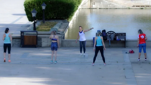 people, exercising, recreation, sports, outdoors, pavement, lake, nature, instructor, summer, street, park, fitness. W-2 or 1099: classifying instructors in US studios